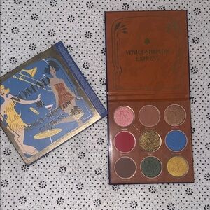 (NWT ) Nomad Express Eyeshadow Palette with Red, Gold, and Brown Hues
